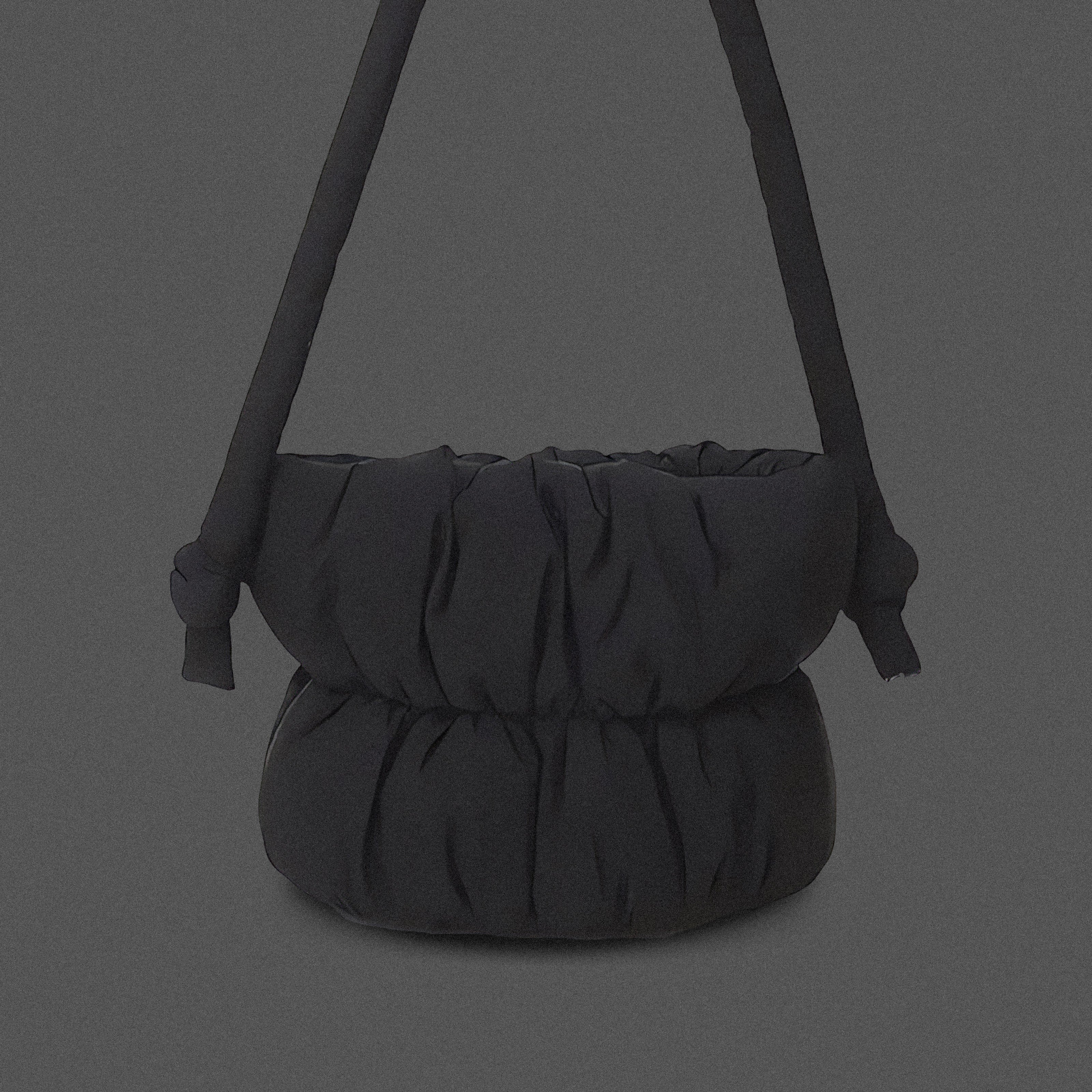 PLSH black women’s designer puffer handbag on a gray background