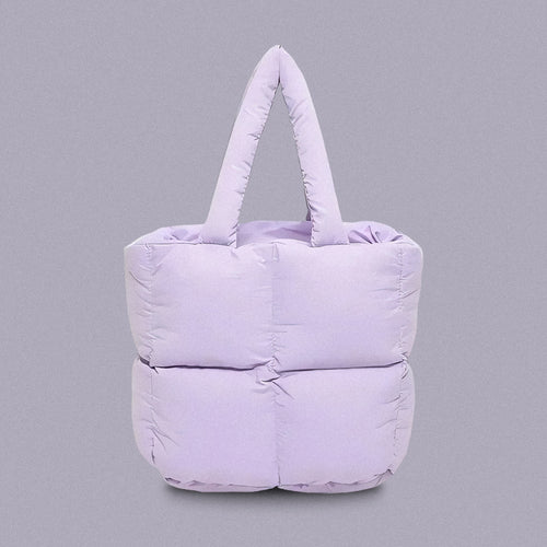 PLSH lilac women’s designer puffer handbag on a lilac background