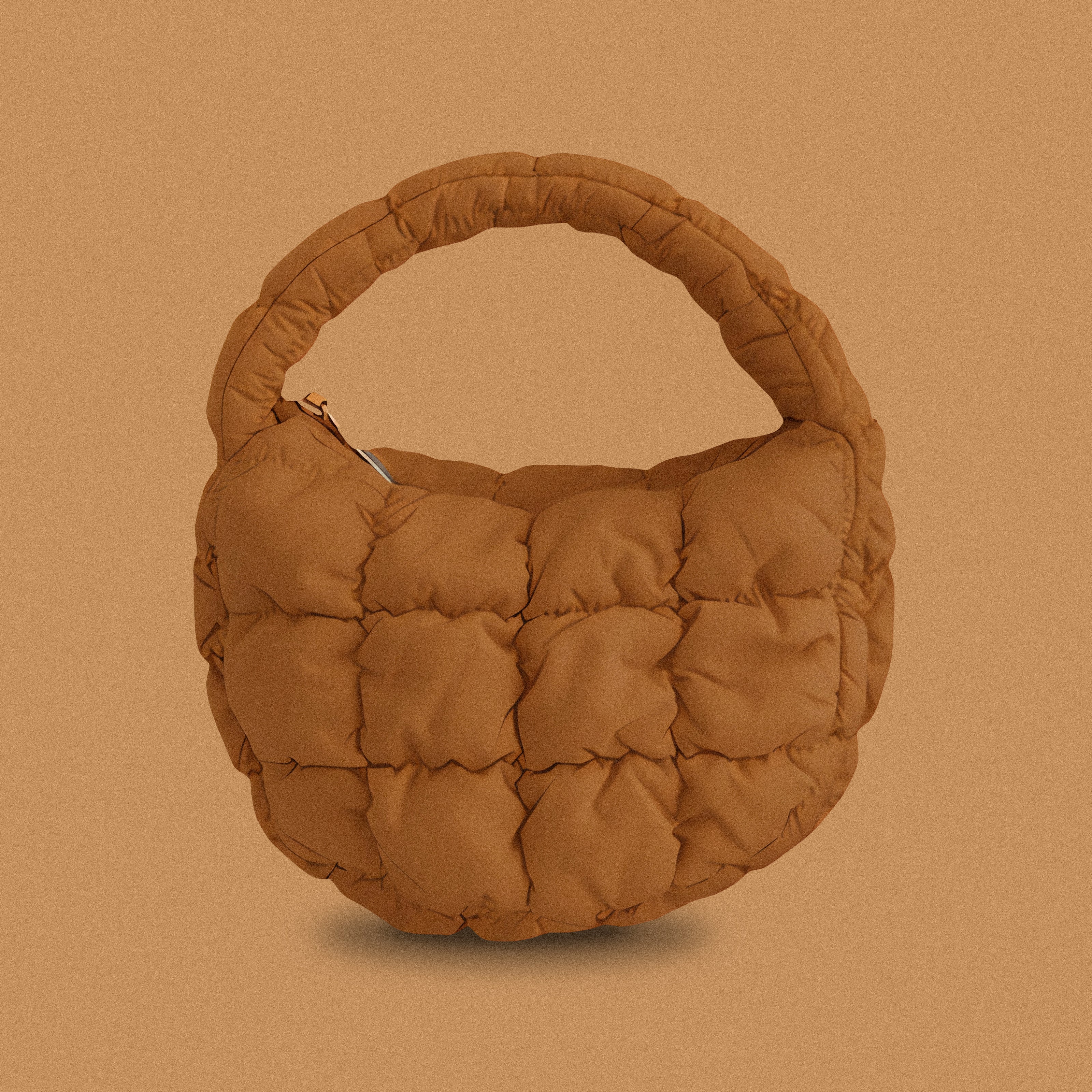 PLSH brown women’s designer puffer handbag on a brown background