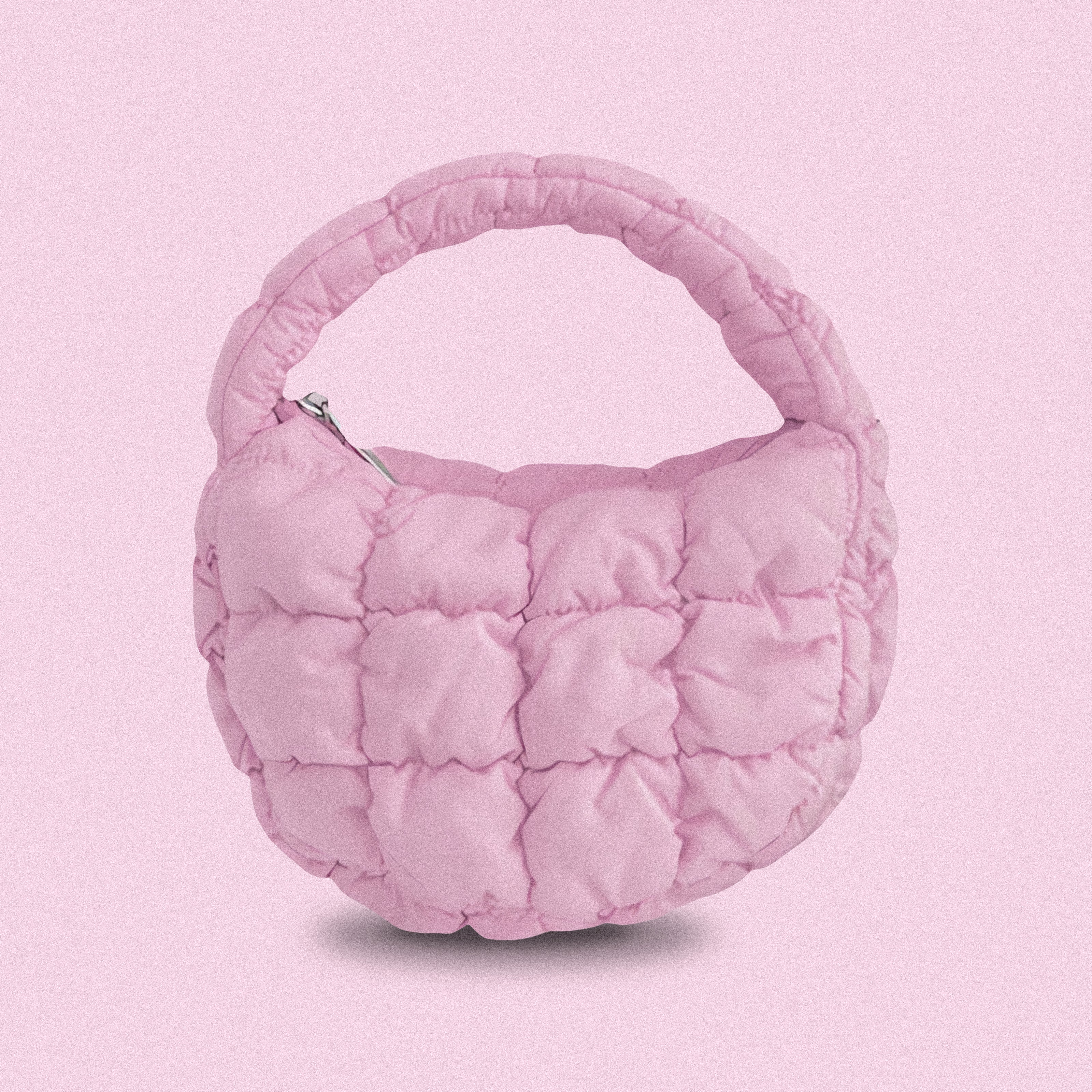 PLSH pink women’s designer puffer handbag on a pink background