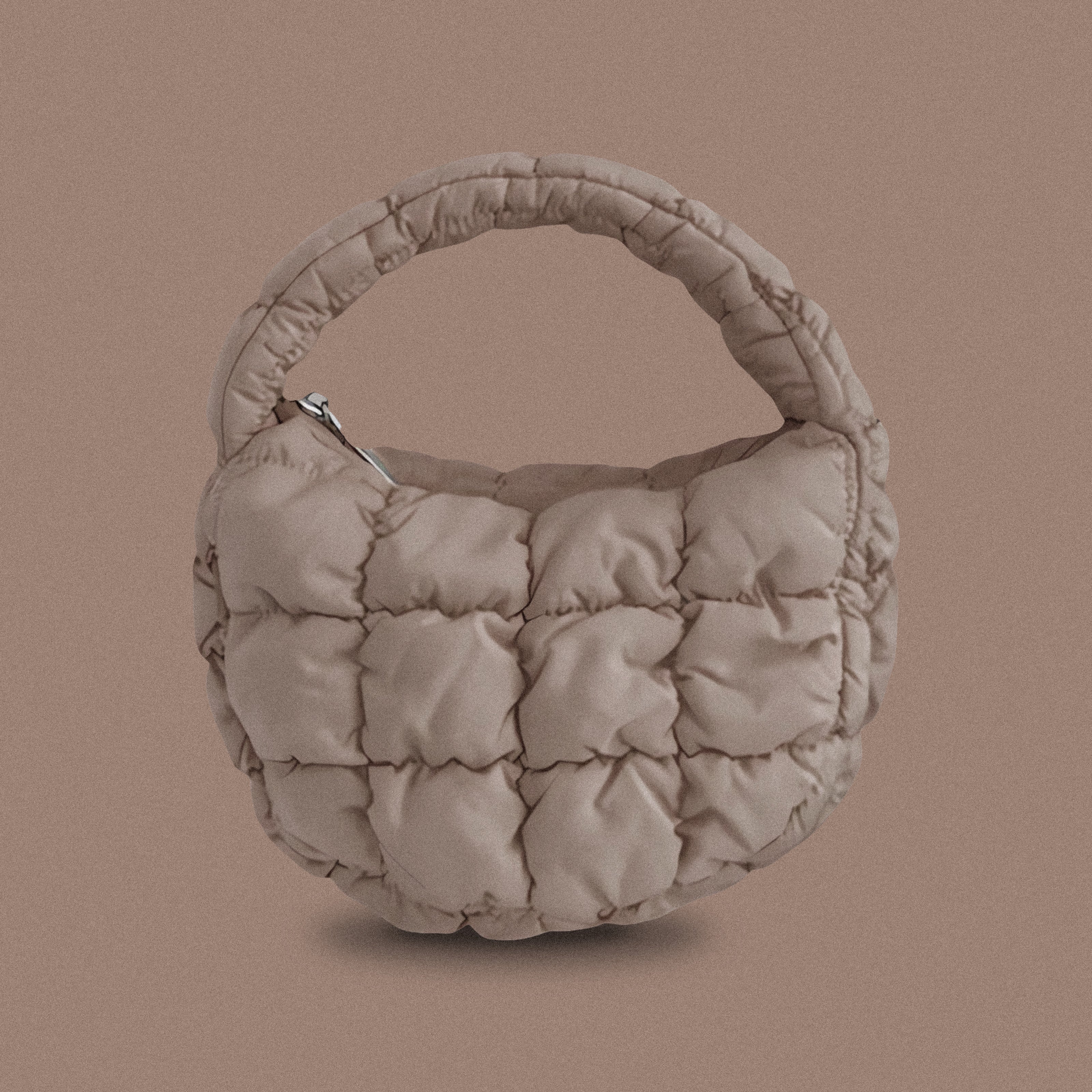 PLSH taupe women’s designer puffer handbag on a taupe background