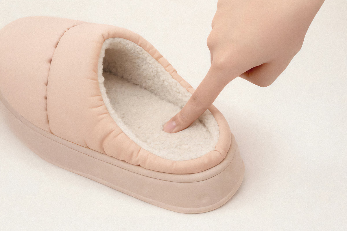 Close-up of PLSH premium soft cushioned women's slipper with plush fleece lining and padded detail