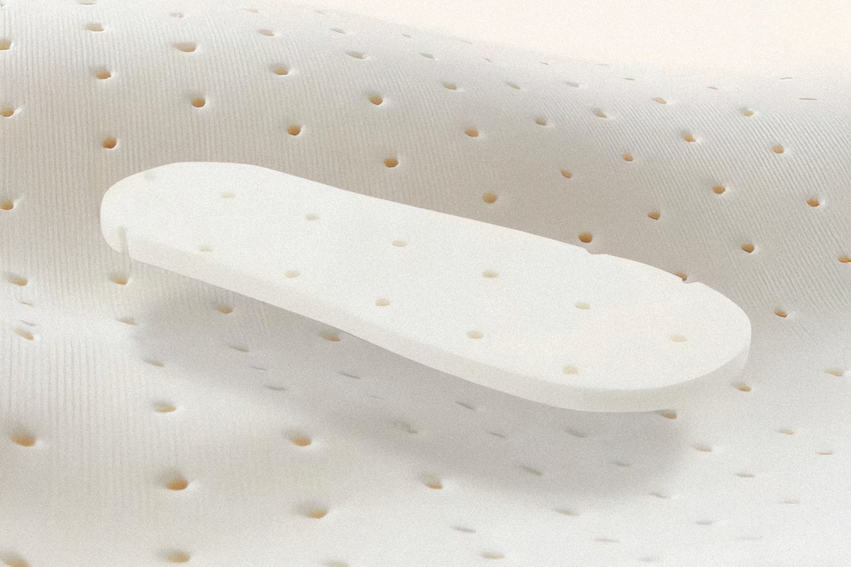 PLSH premium women's slippers showing white insole on a textured white background